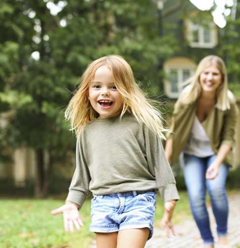 Mom playing with her daughter